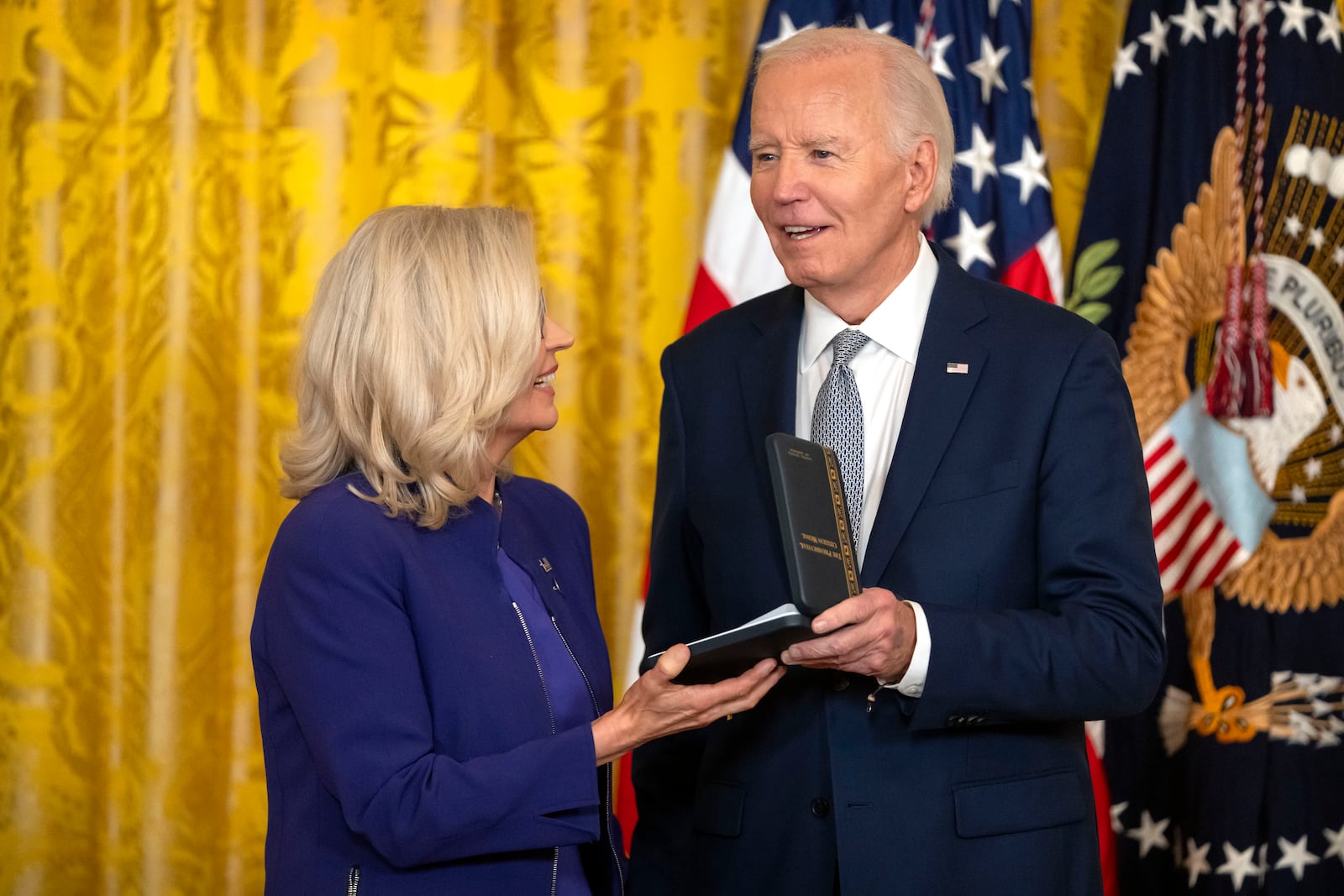 President Joe Biden awards the Presidential Citizens Medal to former Rep. Liz Cheney, R-Wyo., during a ceremony in the East Room at the White House, Thursday, Jan. 2, 2025, in Washington. (AP Photo/Mark Schiefelbein)