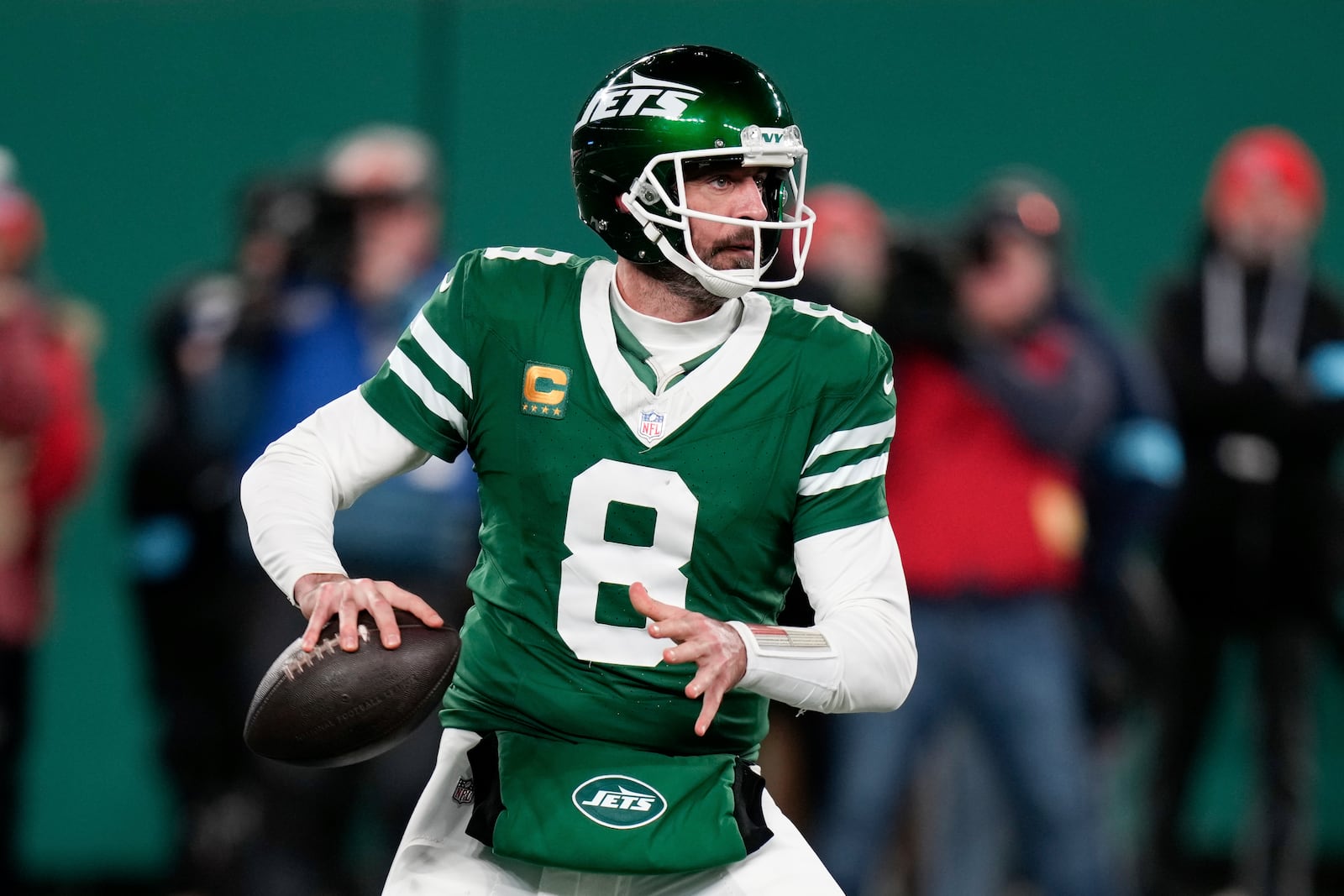 New York Jets quarterback Aaron Rodgers (8) throws during the second half of an NFL football game against the Miami Dolphins, Sunday, Jan. 5, 2025, in East Rutherford, N.J. (AP Photo/Seth Wenig)