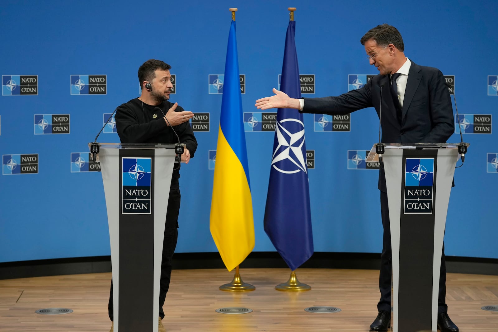 NATO Secretary General Mark Rutte, right, and Ukraine's President Volodymyr Zelenskyy participate in a media conference during a meeting of NATO defense ministers at NATO headquarters in Brussels, Thursday, Oct. 17, 2024. (AP Photo/Virginia Mayo)