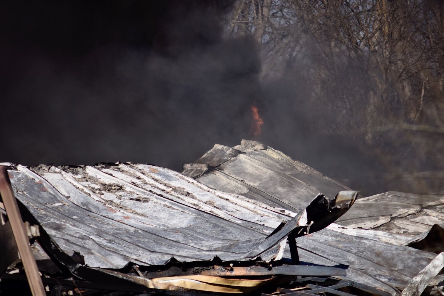 PHOTOS Massive fire at Wholesale Tire Mart in Morgan Township