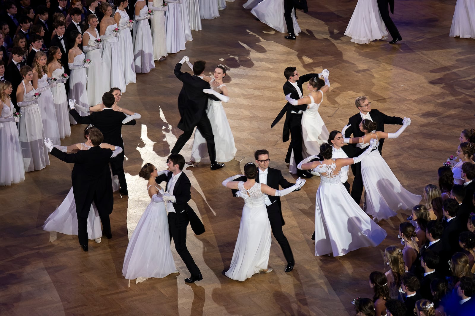 Young people dance waltz during the opening ceremony of the Elmayer-Kränzchen, a Traditional Ball of the Elmayer Dance School in Vienna, Austria, Tuesday, March 4, 2025. (AP Photo/Denes Erdos)