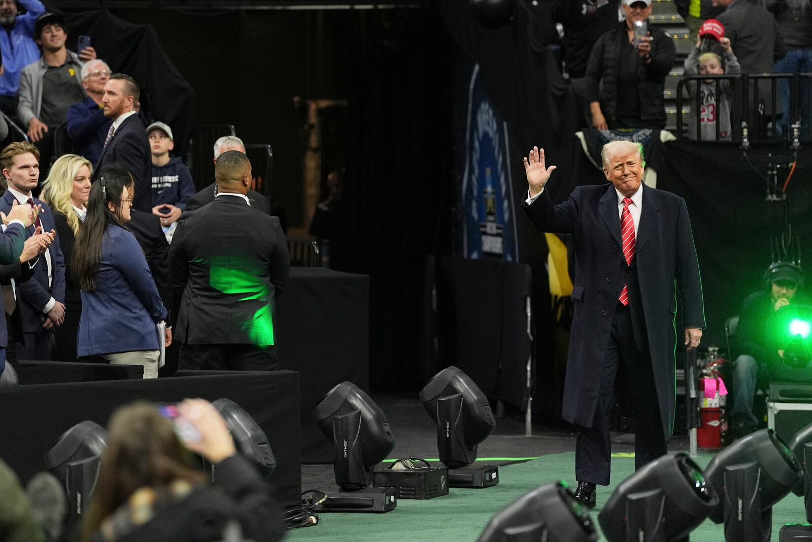 President Donald Trump attends the finals at the NCAA wrestling championship, Saturday, March 22, 2025, in Philadelphia. (AP Photo/Matt Rourke)