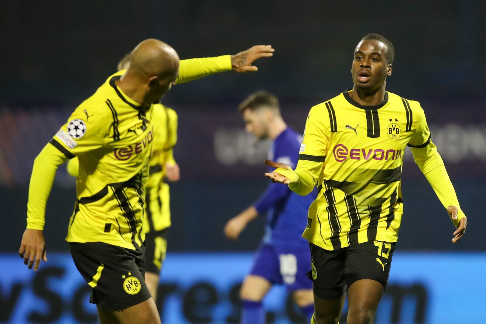 Dortmund's Jamie Bynoe-Gittens, right, celebrates after scoring his side's opening goal during the Champions League soccer match between Dinamo Zagreb and Dortmund at Maksimir Stadium, in Zagreb, Croatia, Wednesday, Nov. 27, 2024. (AP Photo)