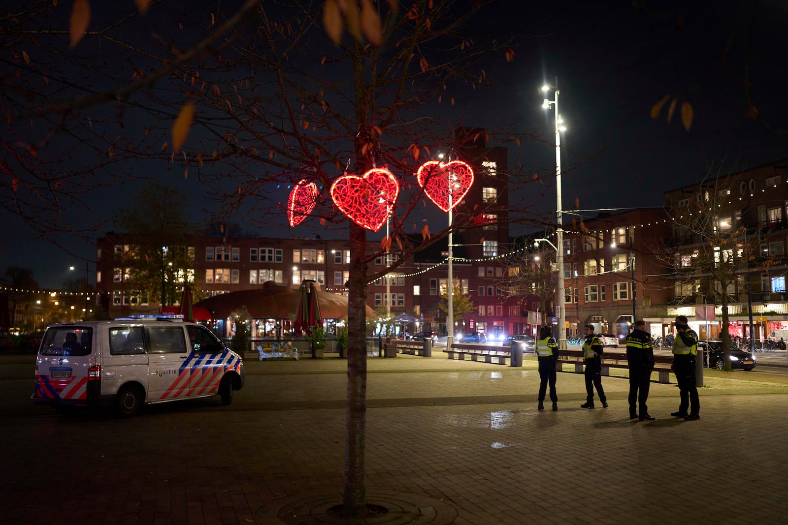 Police officers are patrolling a the Mercator square in Amsterdam, Netherlands, Tuesday, Nov. 12, 2024, as the city is facing tensions following violence last week. (AP Photo/Bram Janssen)