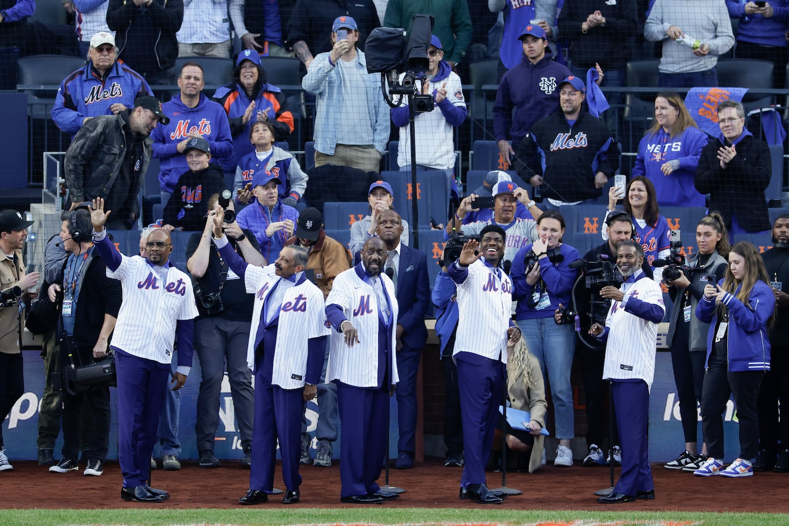 The Temptations perform before Game 5 of a baseball NL Championship Series between the Los Angeles Dodgers and the New York Mets, Friday, Oct. 18, 2024, in New York.(AP Photo/Adam Hunger)