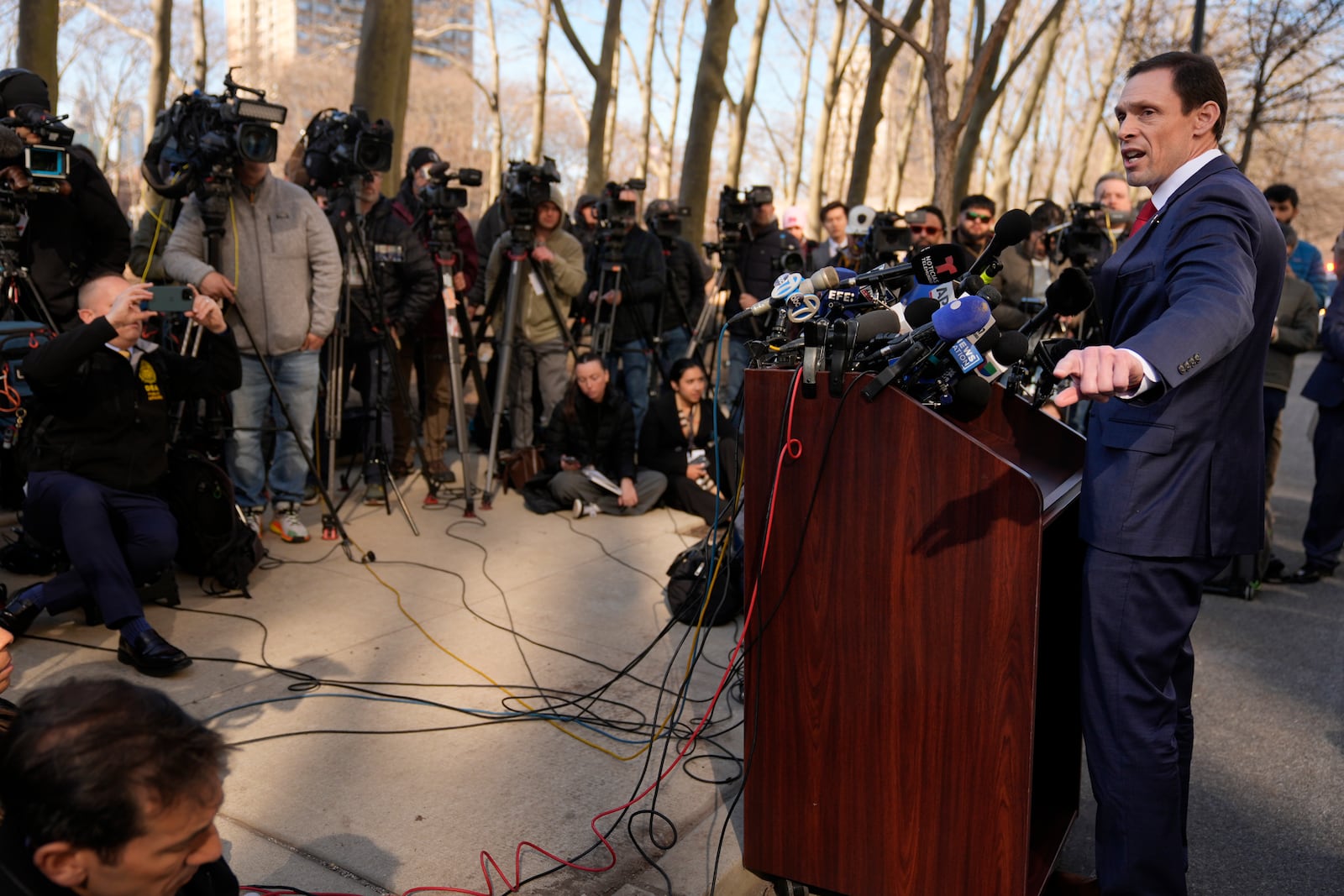 DEA special agent Frank Tarantino II, right, speaks at a news conference outside the federal courthouse in the Brooklyn borough of New York, Friday, Feb. 28, 2025, following the arraignment of Cartel leaders Rafael Caro Quintero and Vicente Carrillo Fuentes. (AP Photo/Seth Wenig)