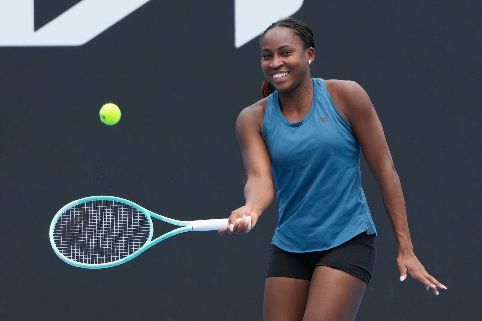 Coco Gauff of the United States plays a forehand return compatriot Danielle Collins during a practice session ahead of the Australian Open tennis championship in Melbourne, Australia, Thursday, Jan. 9, 2025. (AP Photo/Mark Baker)