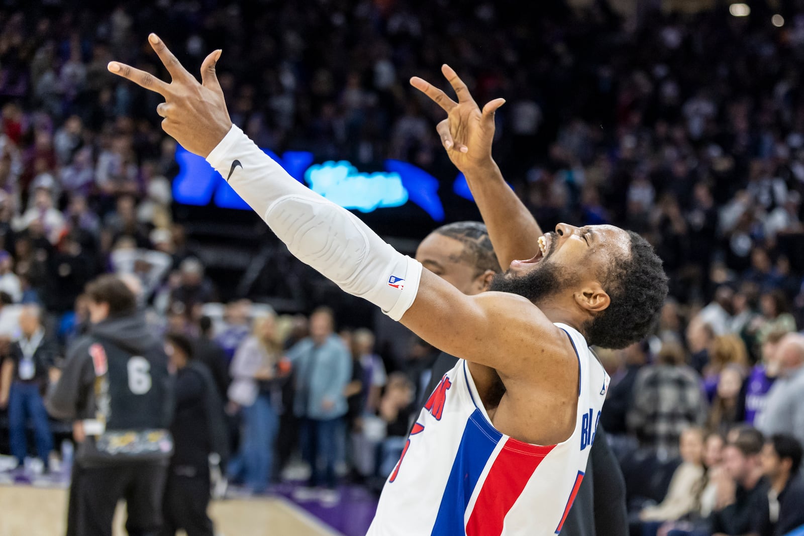 Detroit Pistons guard Malik Beasley celebrates at the end of an NBA basketball game against the Sacramento Kings, Thursday, Dec. 26, 2024, in Sacramento, Calif. (AP Photo/Sara Nevis)