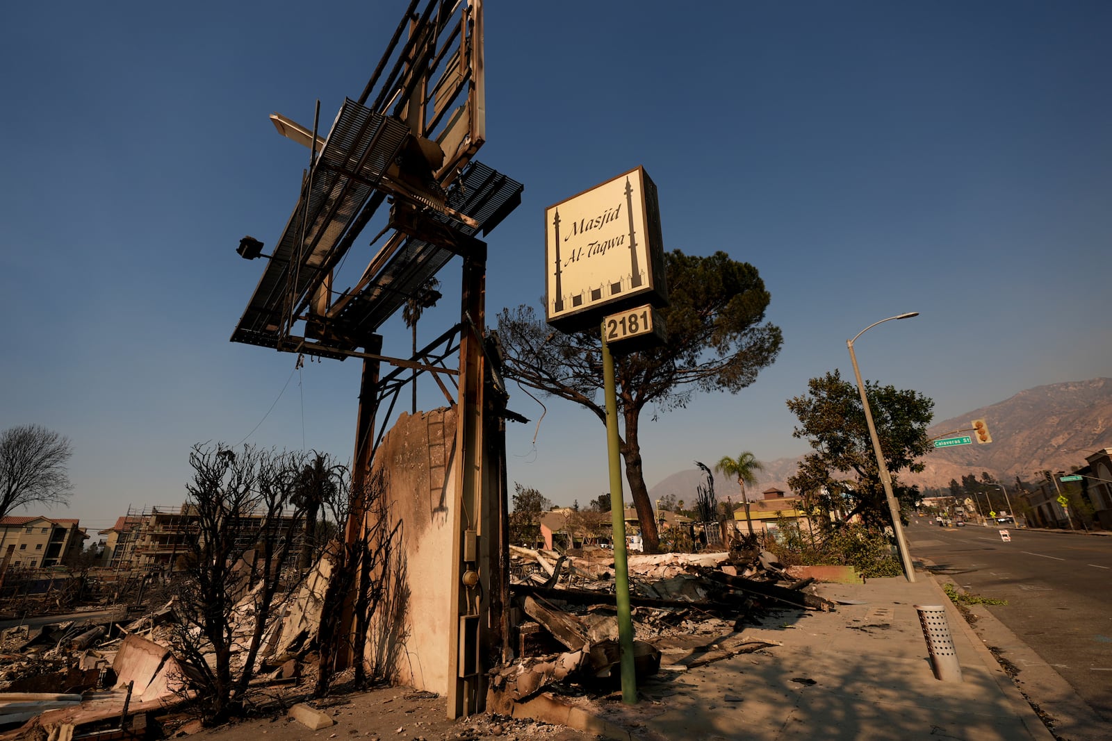 The remains of the Masjid-Al-Taqwa mosque ares seen in the aftermath of the Eaton Fire Friday, Jan. 10, 2025 in Altadena, Calif. (AP Photo/Jae C. Hong)