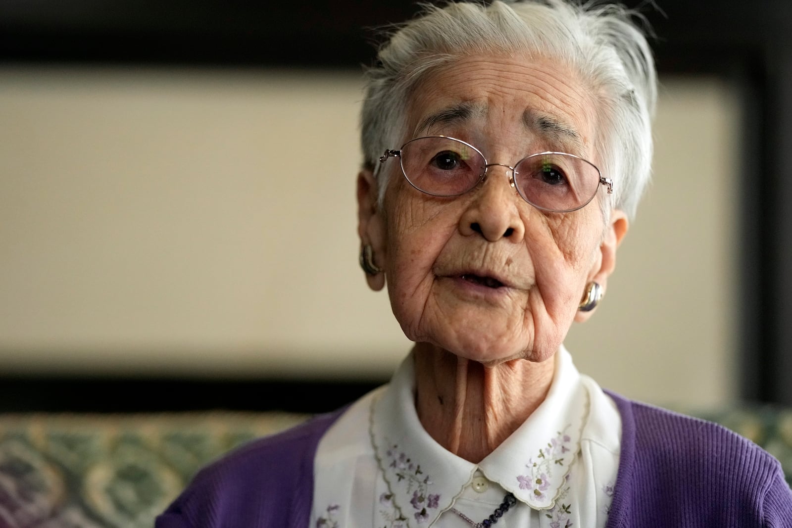 Reiko Muto, 97-year-old, former nurse student speaks on her experience with The Associated Press on Feb. 18, 2025, at St Luke's International Hospital in Tokyo. (AP Photo/Eugene Hoshiko)