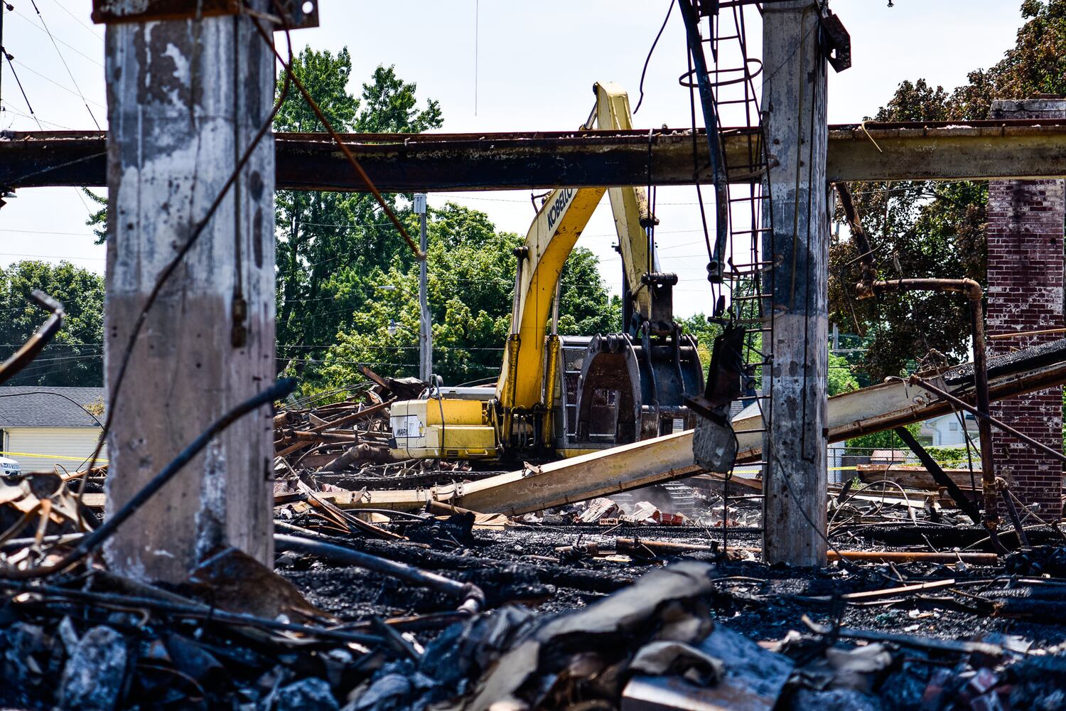 Crews demolish warehouse after massive fire in Hamilton