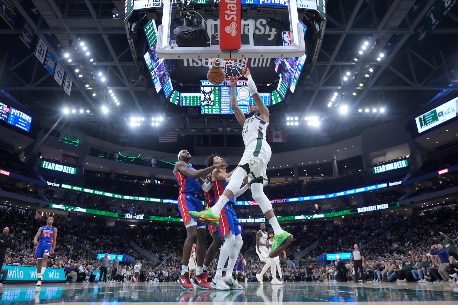 Milwaukee Bucks' Giannis Antetokounmpo dunks during the second half of an NBA basketball game against the Detroit Pistons Wednesday, Nov. 13, 2024, in Milwaukee. (AP Photo/Morry Gash)