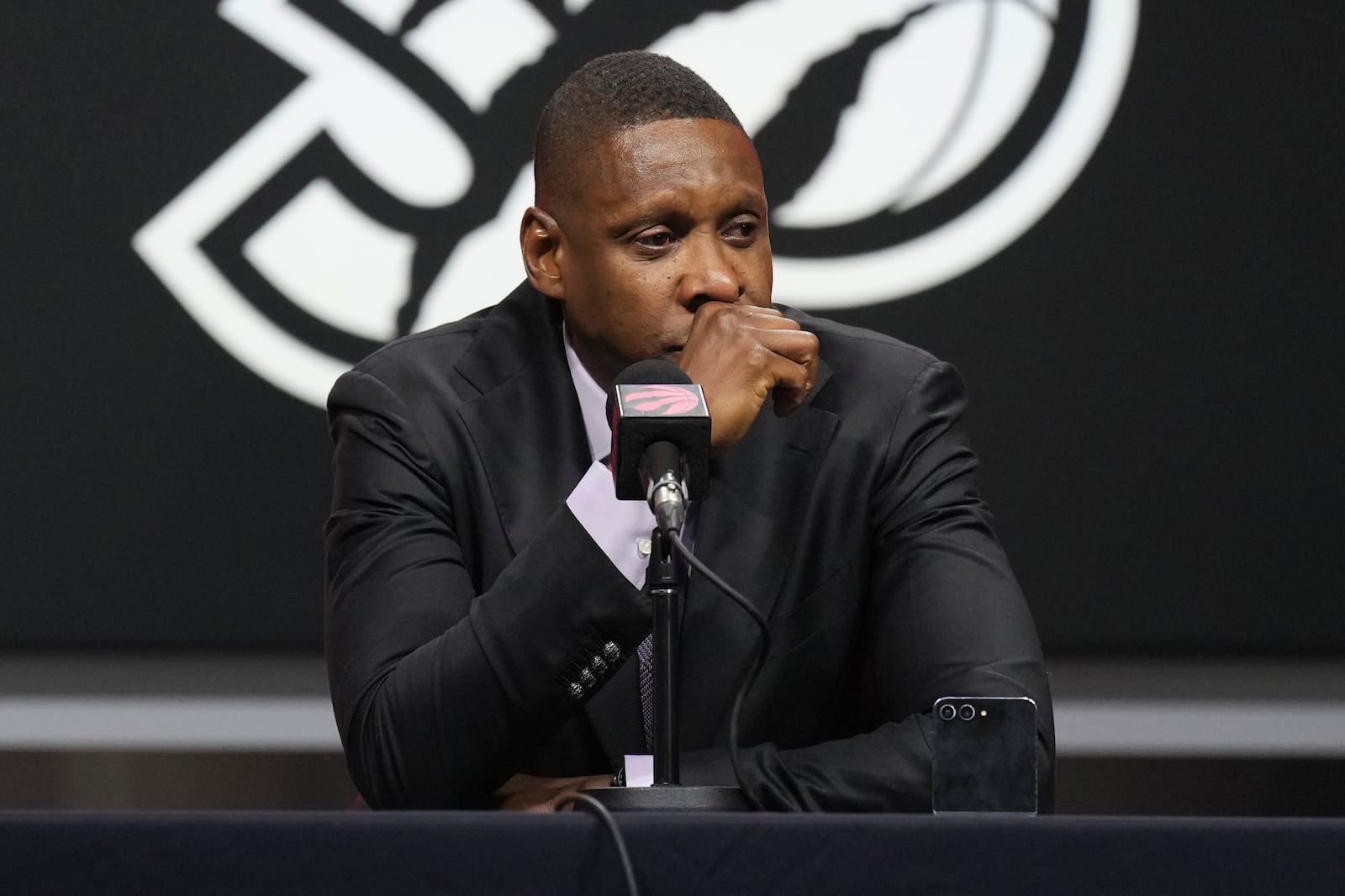 Toronto Raptors NBA basketball team President Masai Ujiri reacts as he speaks about the death of Dikembe Mutombo in Toronto, Monday, Sept. 30, 2024. (Chris Young/The Canadian Press via AP)