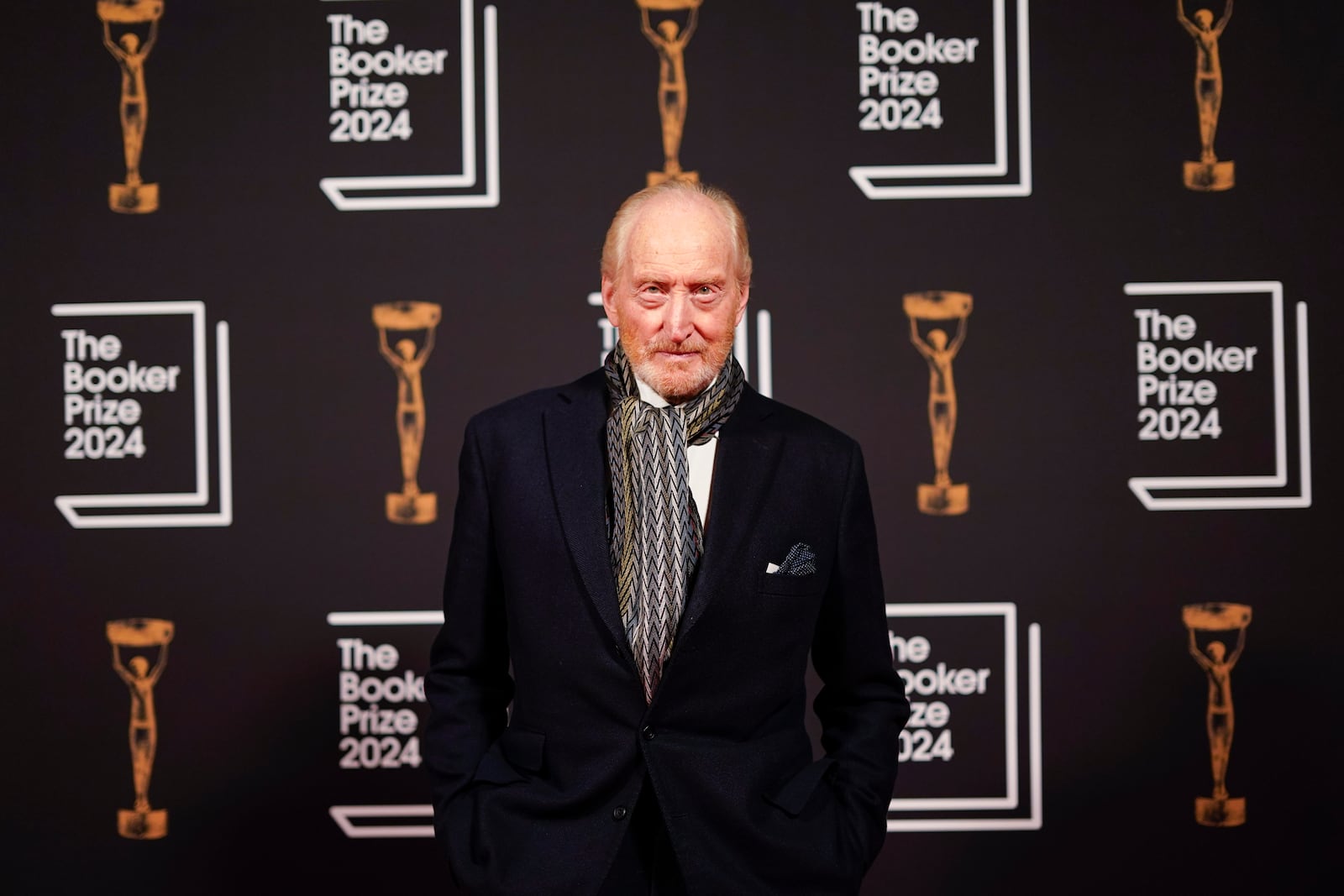 Charles Dance arrives at the Booker Prize award dinner in London, Tuesday, Nov. 12, 2024. (AP Photo/Alberto Pezzali)