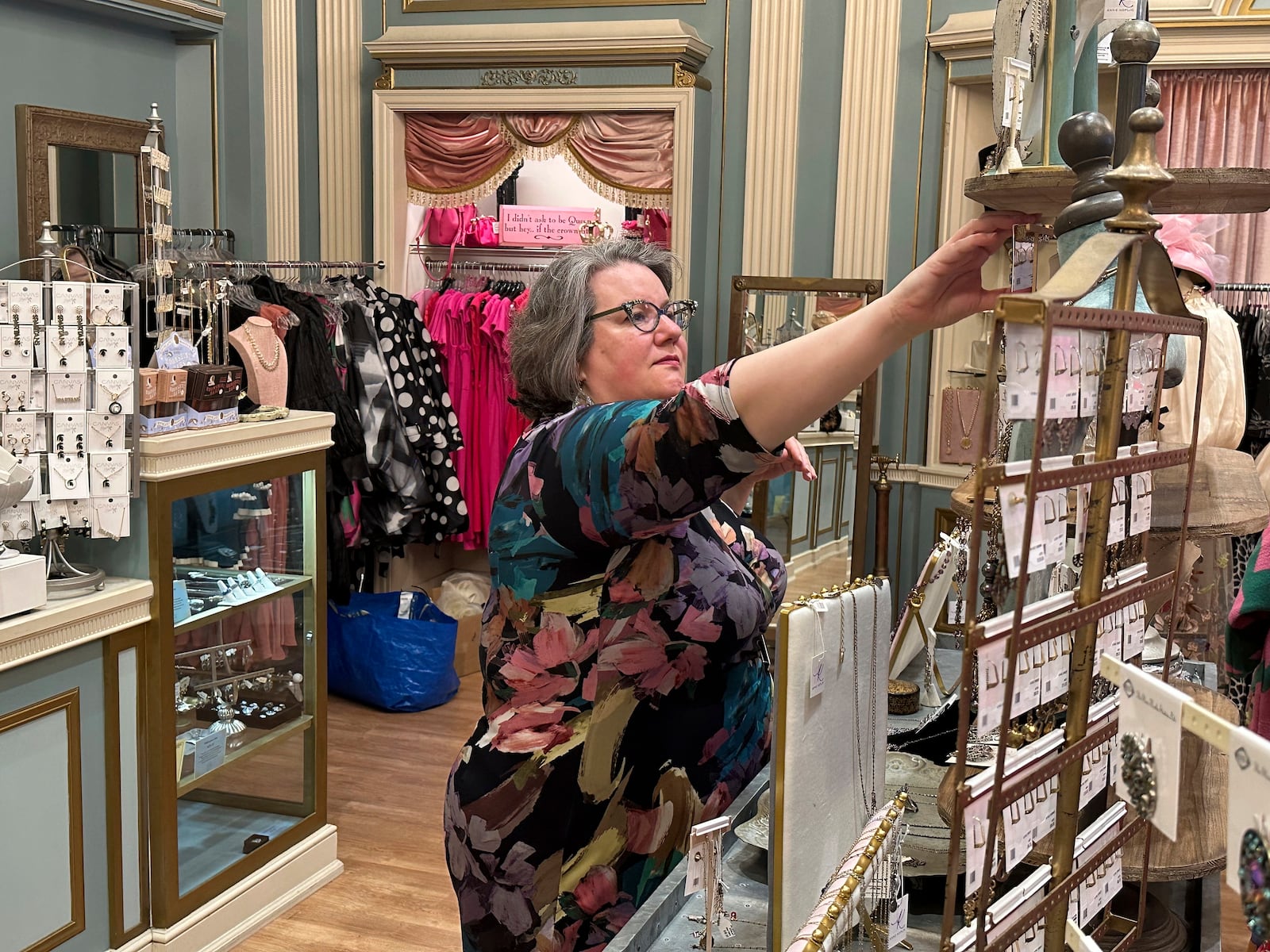 Owner Rachel Lutz at her Peacock Room women's boutique shop in Detroit's Fisher Building that carries products from Canada, Tuesday, March 4, 2025. (AP Photo/Corey Williams)