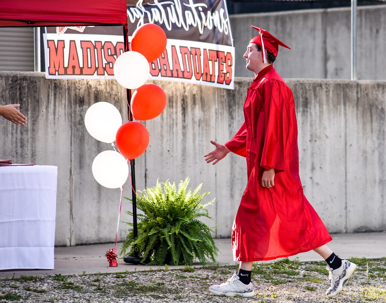 Madison High School drive-thru graduation ceremony at Land of Illusion