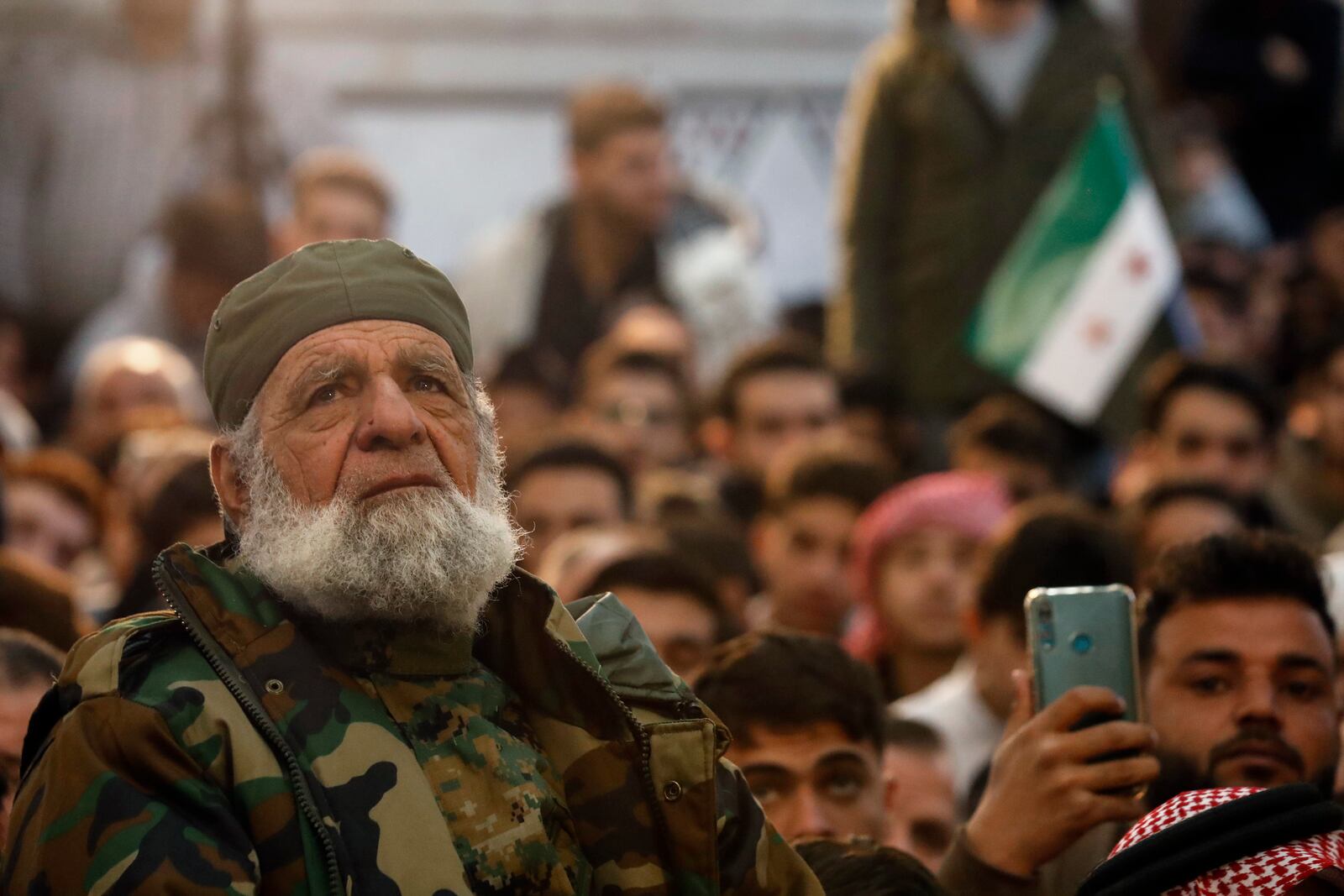 Syrians attend Friday prayers inside the 7th century Umayyad Mosque in Damascus, Syria, Friday, Dec. 13, 2024. (AP Photo/Omar Sanadiki)