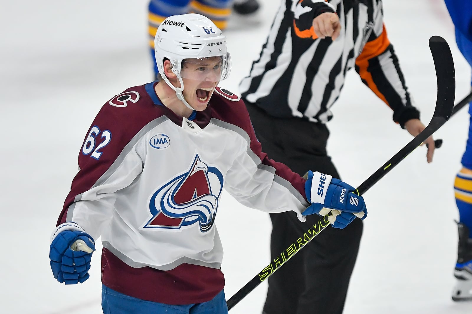 Colorado Avalanche left wing Artturi Lehkonen (62) celebrates after scoring during the third period of an NHL hockey game against the Buffalo Sabres in Buffalo, N.Y., Tuesday, Dec. 3, 2024. (AP Photo/Adrian Kraus)