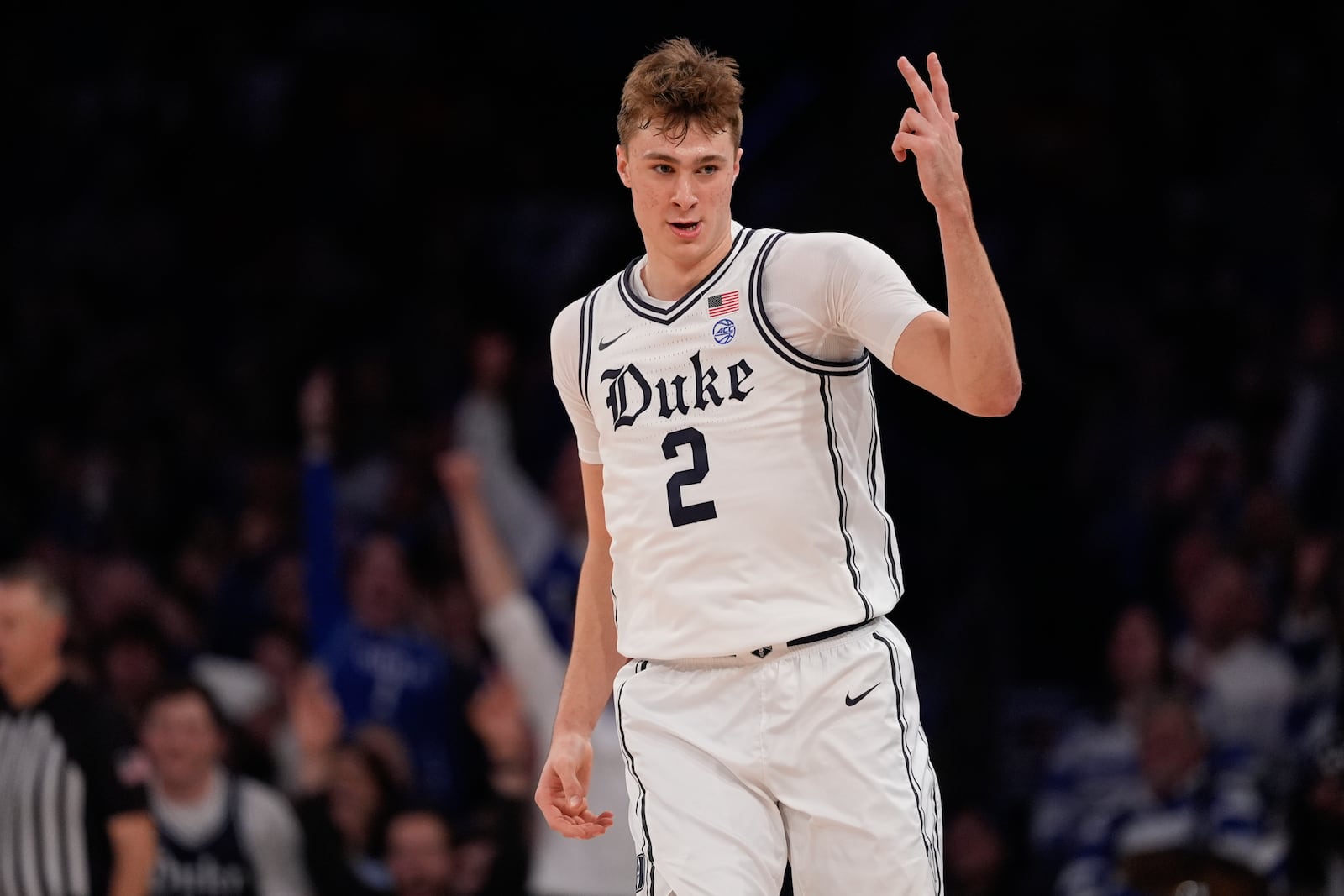 Duke's Cooper Flagg (2) gestures after making a three-point shot during the second half of an NCAA college basketball game against Illinois Saturday, Feb. 22, 2025, in New York. (AP Photo/Frank Franklin II)