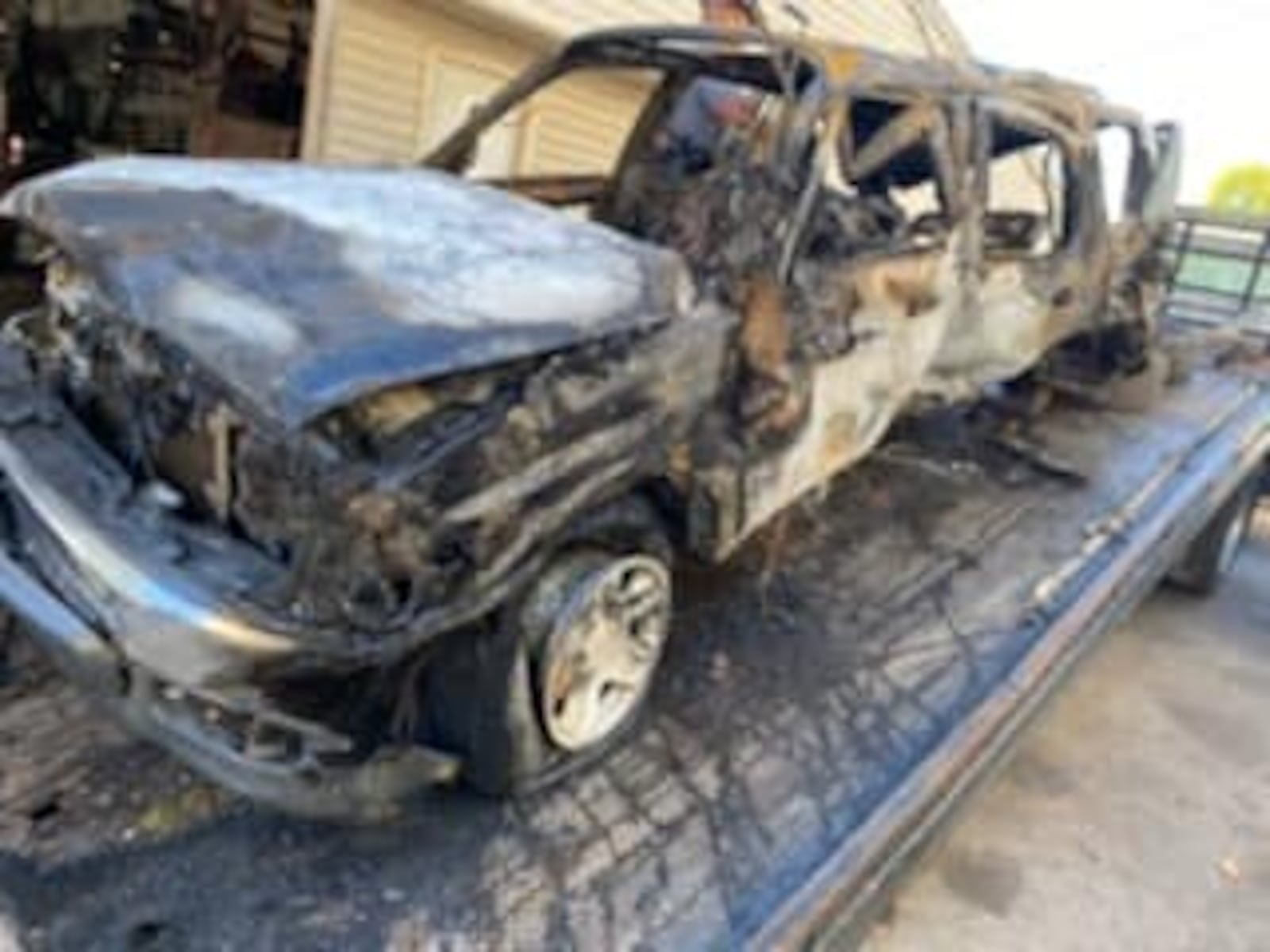 Burned and wrecked SUV driven by Megan Riley on Sept. 19 on Ohio 503 in Preble County SUBMITTED