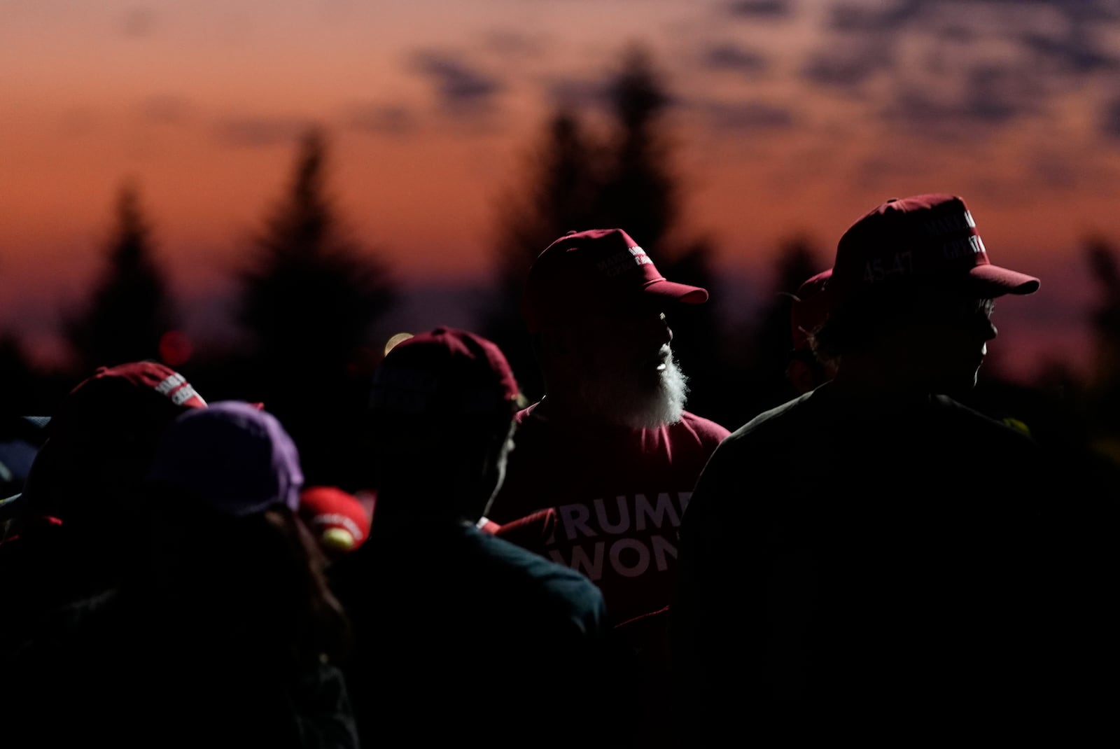 Supporters wait to enter to see Republican presidential nominee former President Donald Trump speak at a campaign rally at the Gaylord Rockies Resort and Convention Center Friday, Oct. 11, 2024, in Aurora, Colo. (AP Photo/David Zalubowski)