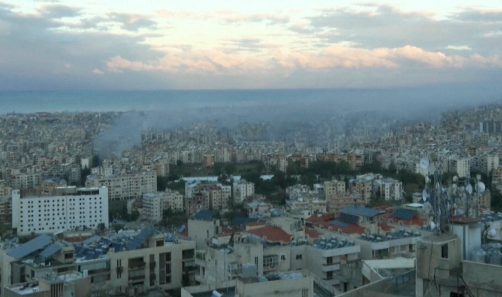 In this image made from video, smoke is seen amid buildings in Beirut, Lebanon, Wednesday, Nov. 27, 2024. (AP Photo)