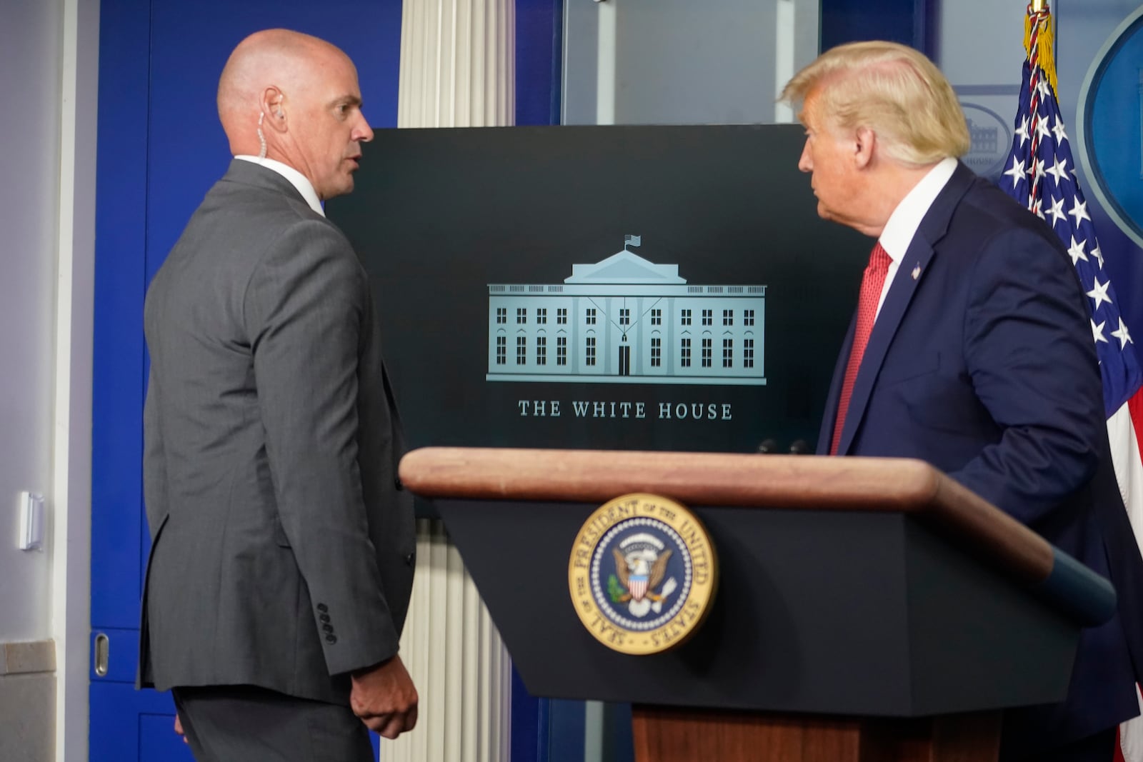 President Donald Trump departs a news conference at the request of the Secret Service at the White House in Washington, Monday, Aug. 10, 2020. President Trump returned shortly thereafter and said there had been a shooting near the White House. (Doug Mills/The New York Times)