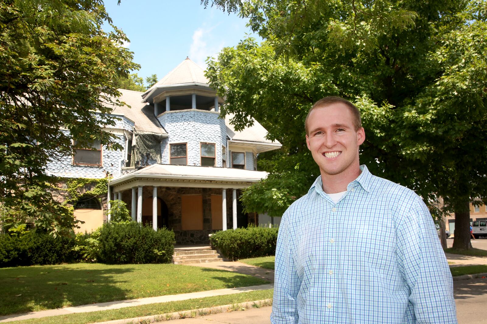 Chris Lewis, a Vandalia native, was awarded the historic Cox House in the Dayton View Historic District. In April the owner decided to give the dilapidated former home of Gov. James M. Cox away. More than 70 people responded to the offer. LISA POWELL / STAFF