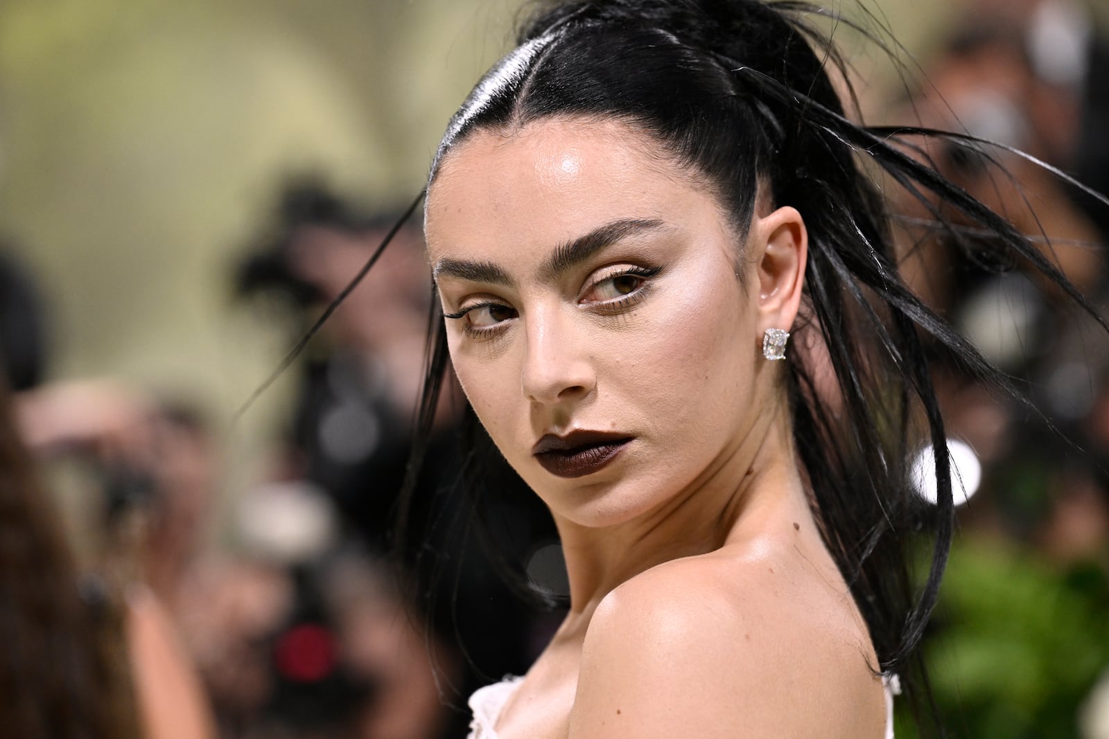 FILE - Charli XCX attends The Metropolitan Museum of Art's Costume Institute benefit gala celebrating the opening of the "Sleeping Beauties: Reawakening Fashion" exhibition, May 6, 2024, in New York. (Photo by Evan Agostini/Invision/AP, File)