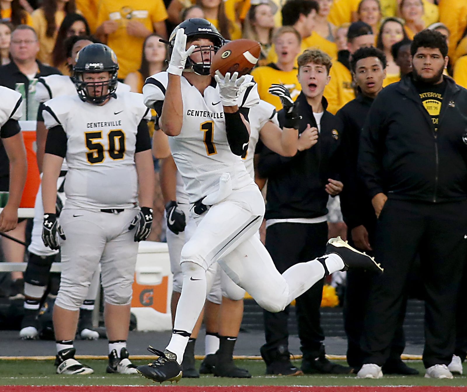 Centerville wide receiver Jake Spiewak catches a pass and runs for an 80-yard touchdown against Fairfield during the Elks’ 30-23 victory Friday night in the Skyline Chili Crosstown Showdown at Fairfield Stadium. CONTRIBUTED PHOTO BY E.L. HUBBARD