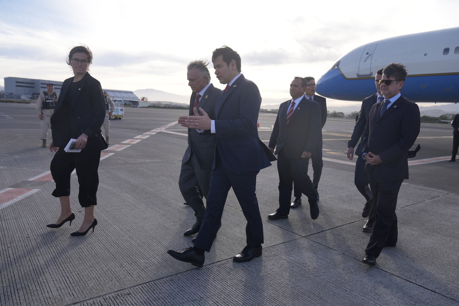 Secretary of State Marco Rubio, front center, talks with Costa Rica Foreign Minister Arnoldo André Tinoco after deplaning at Juan Santamaria International Airport near San Jose, Costa Rica, Tuesday, Feb. 4, 2025. (AP Photo/Mark Schiefelbein, Pool)