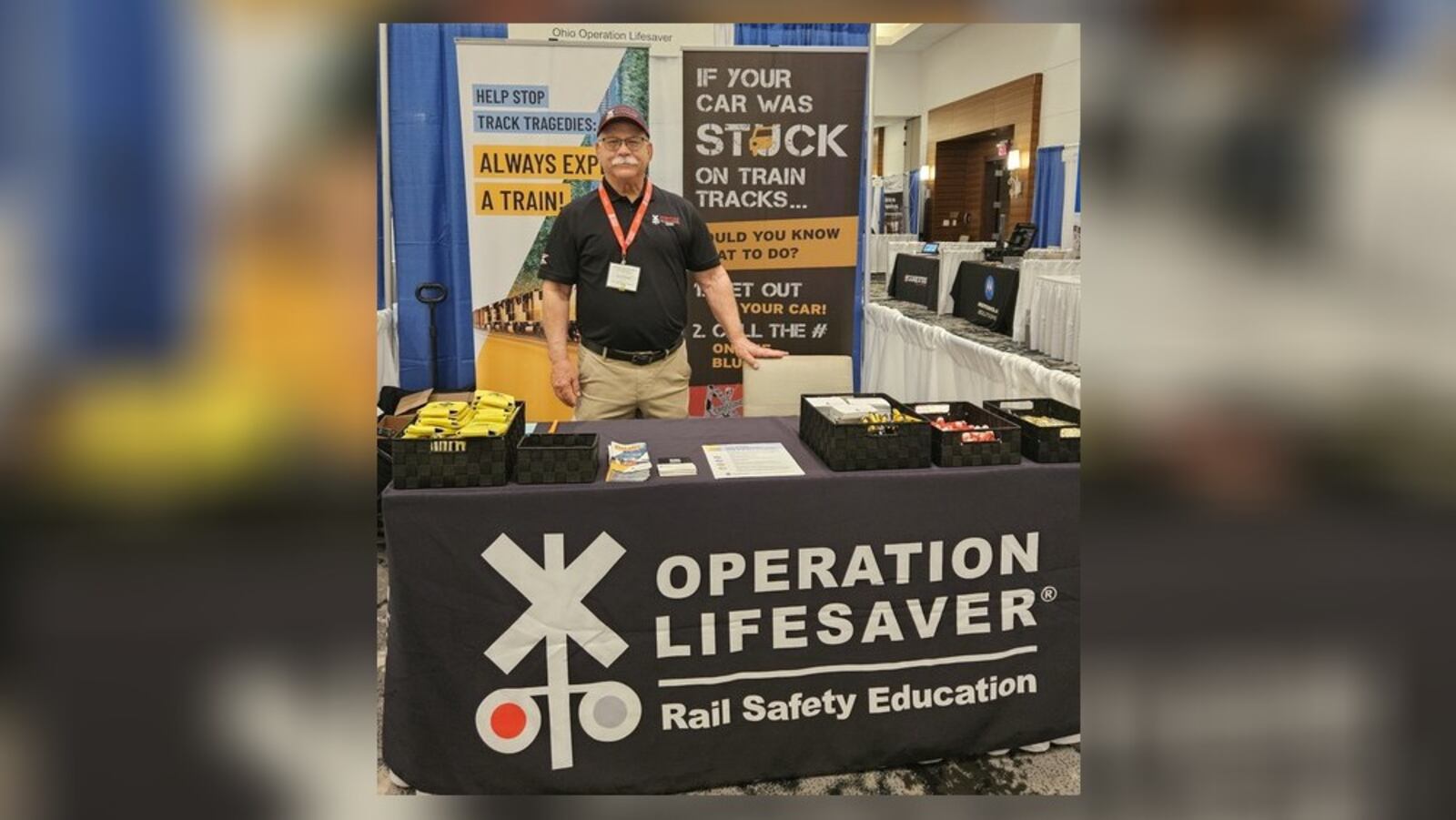 Alan Stouder, state coordinator for Ohio Operation Lifesaver, works at the group's booth at the 2024 Ohio Association of Chiefs of Police conference held in Columbus.