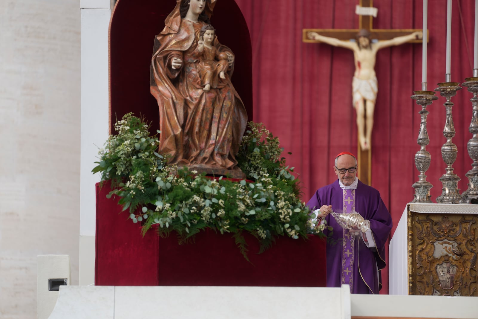 Cardinal Michael Czerny, prefect of the Dicastery for Promoting Integral Human Development, and delegate of Pope Francis celebrates a mass for the members of the world of volunteers in St. Peter's Square at The Vatican, Sunday, March 9, 2025. (AP Photo/Gregorio Borgia)