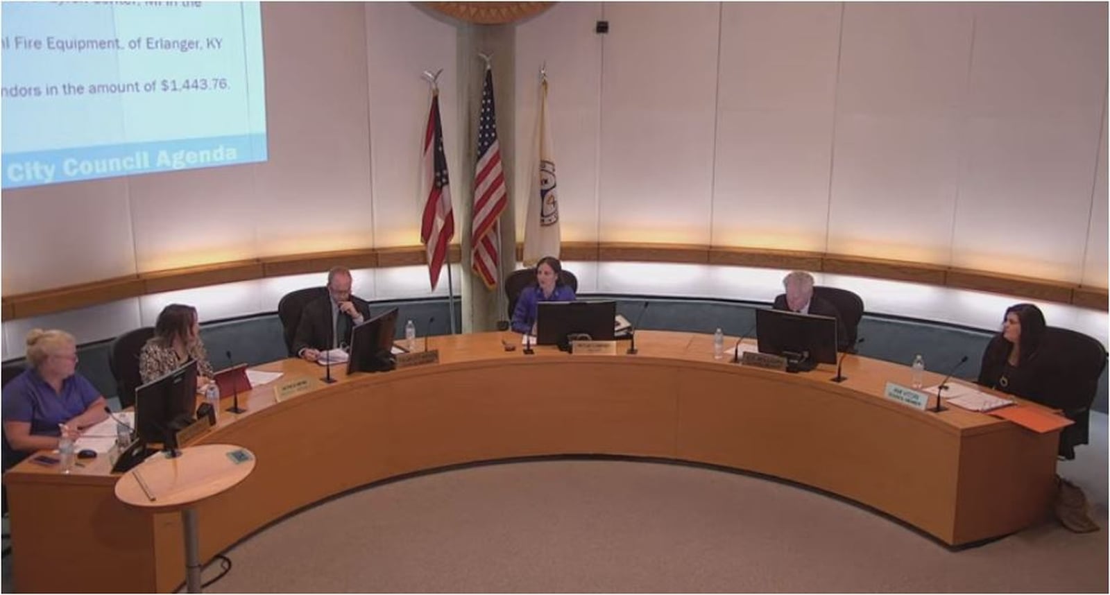 Middletown City Council at its recent meeting spread out across the meeting room’s large dias because of social distancing created because of the coronavirus. MIKE RUTLEDGE/STAFF