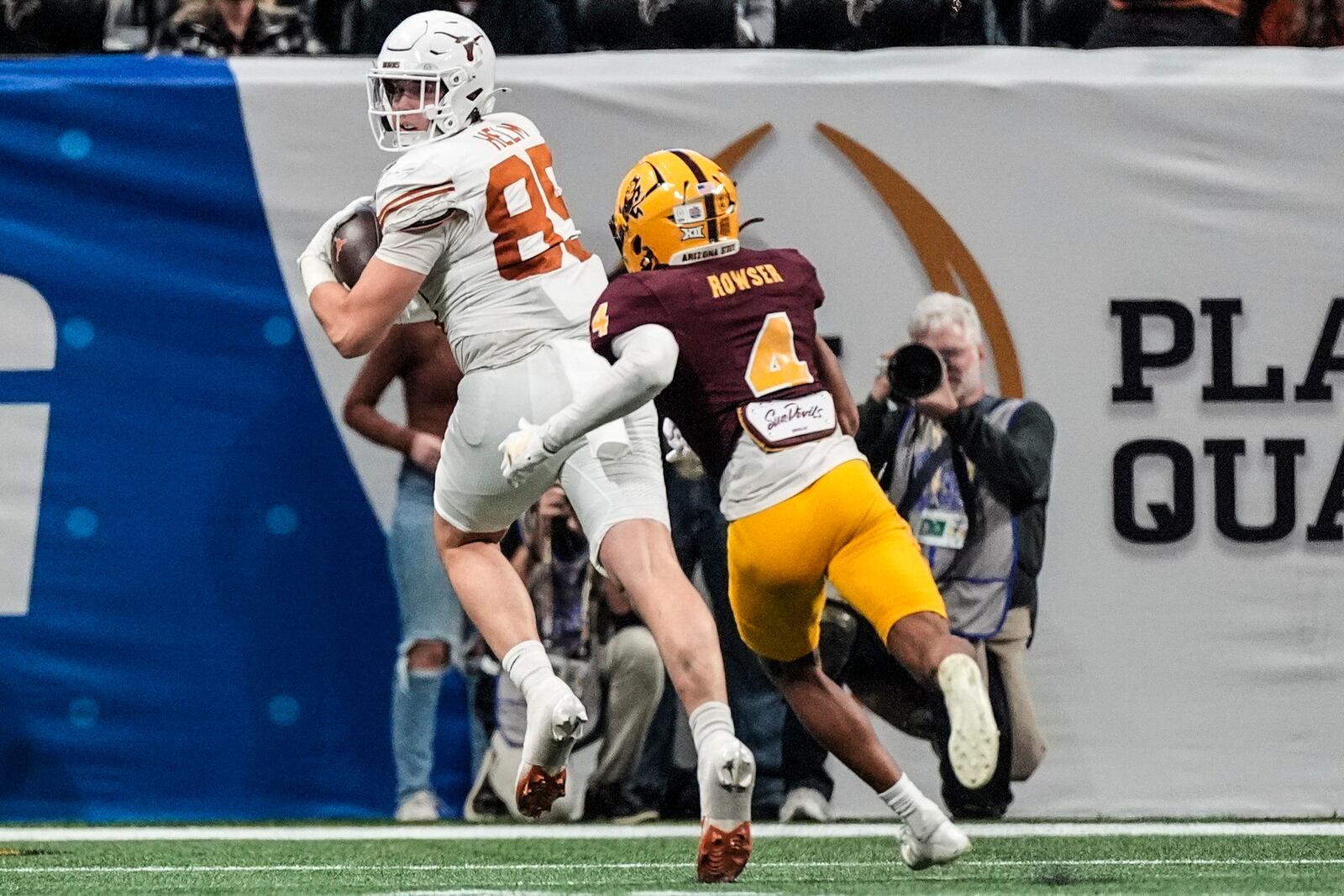 Texas tight end Gunnar Helm (85) runs into the end zone against Arizona State during overtime in the quarterfinals of a College Football Playoff game, Wednesday, Jan. 1, 2025, in Atlanta. Texas won 39-31 in two overtime periods. (AP Photo/John Bazemore)