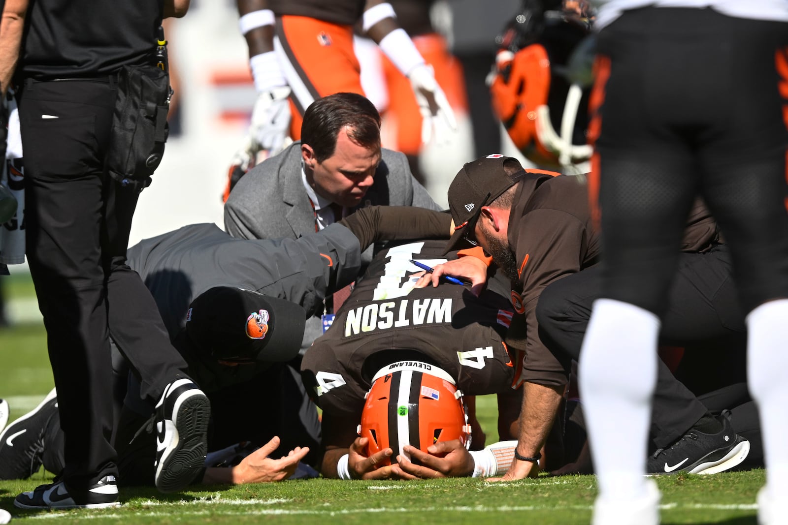 Cleveland Browns quarterback Deshaun Watson (4) reacts after being injured in the first half of an NFL football game against the Cincinnati Bengals, Sunday, Oct. 20, 2024, in Cleveland. (AP Photo/David Richard)