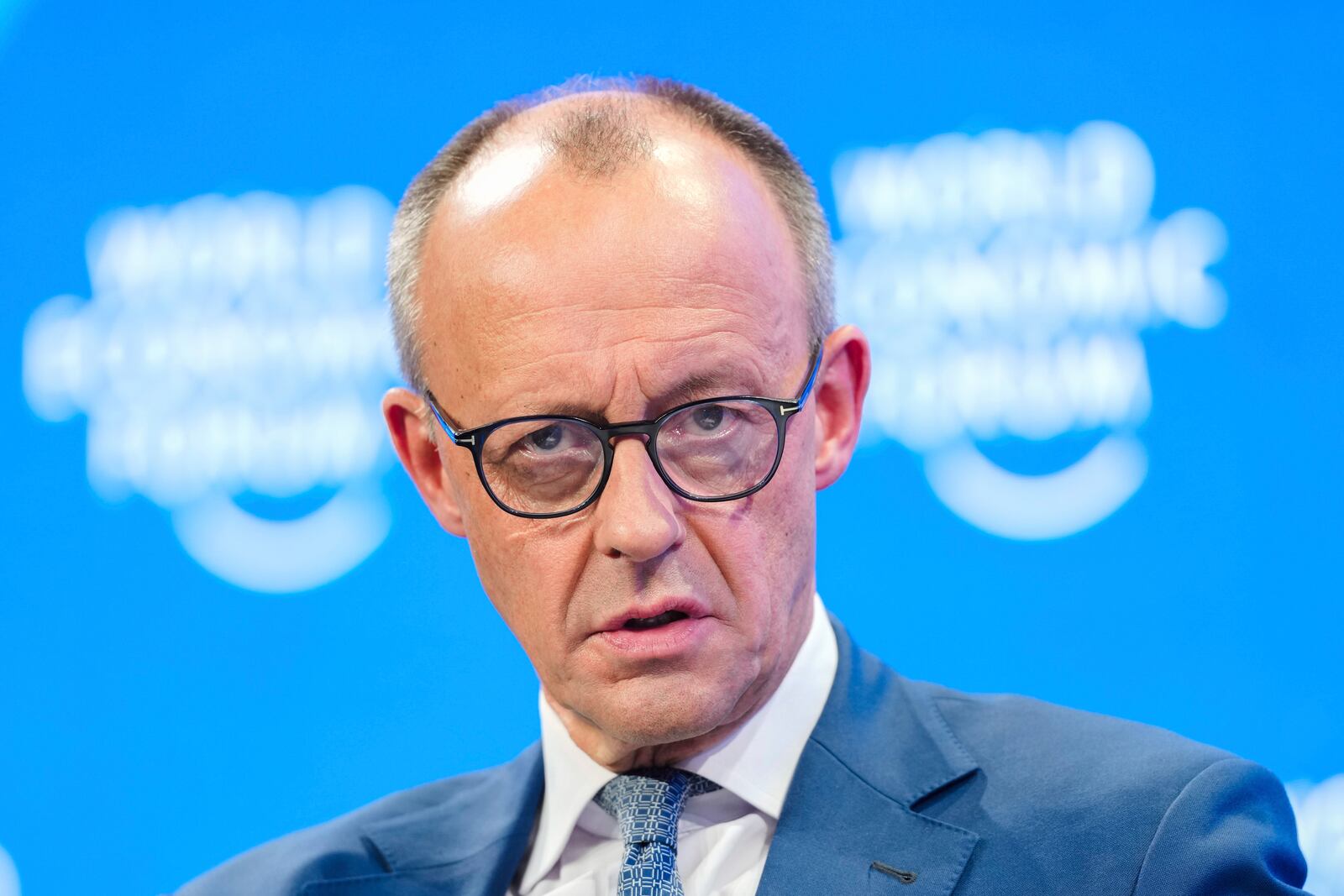 German opposition leader and chairman of the Christian Democratic Union party Friedrich Merz attends the Annual Meeting of World Economic Forum in Davos, Switzerland, Tuesday, Jan. 21, 2025. (AP Photo/Markus Schreiber)