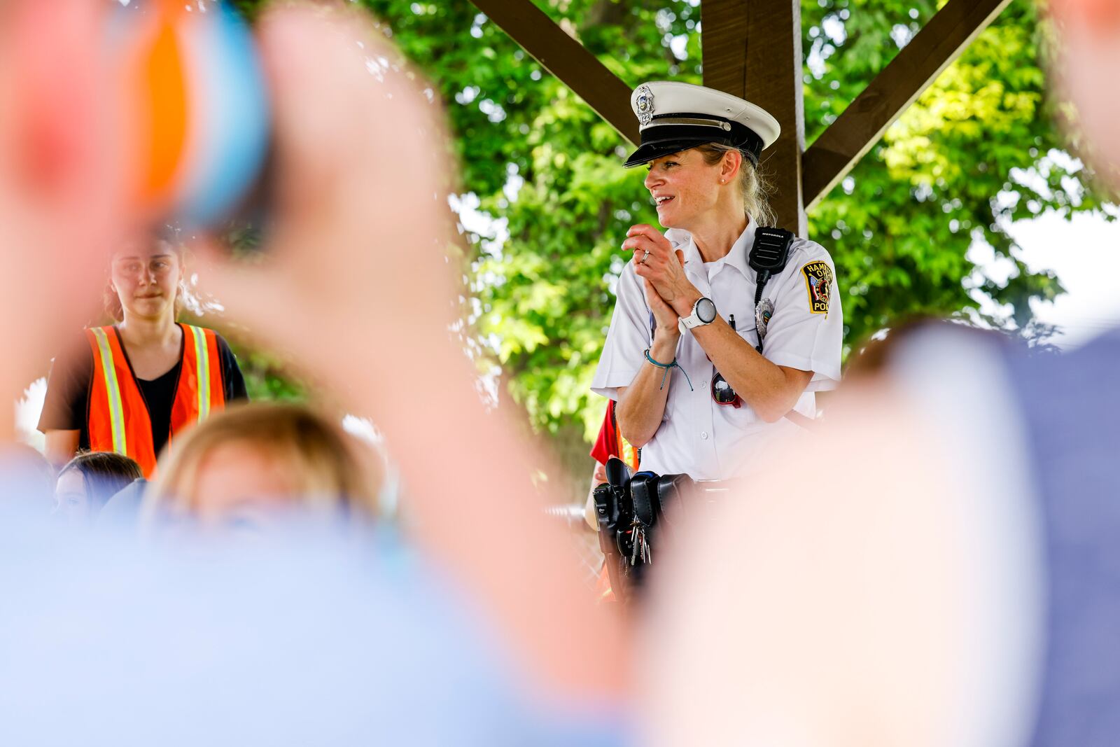 Hamilton Police officer Kristy Collins educates children during the 50th year of Safety Town Monday, June 13, 2022 at Office Bob Gentry Park in Hamilton. Four and five year old children are instructed in pedestrian, vehicle, bus, gun and fire safety. NICK GRAHAM/STAFF