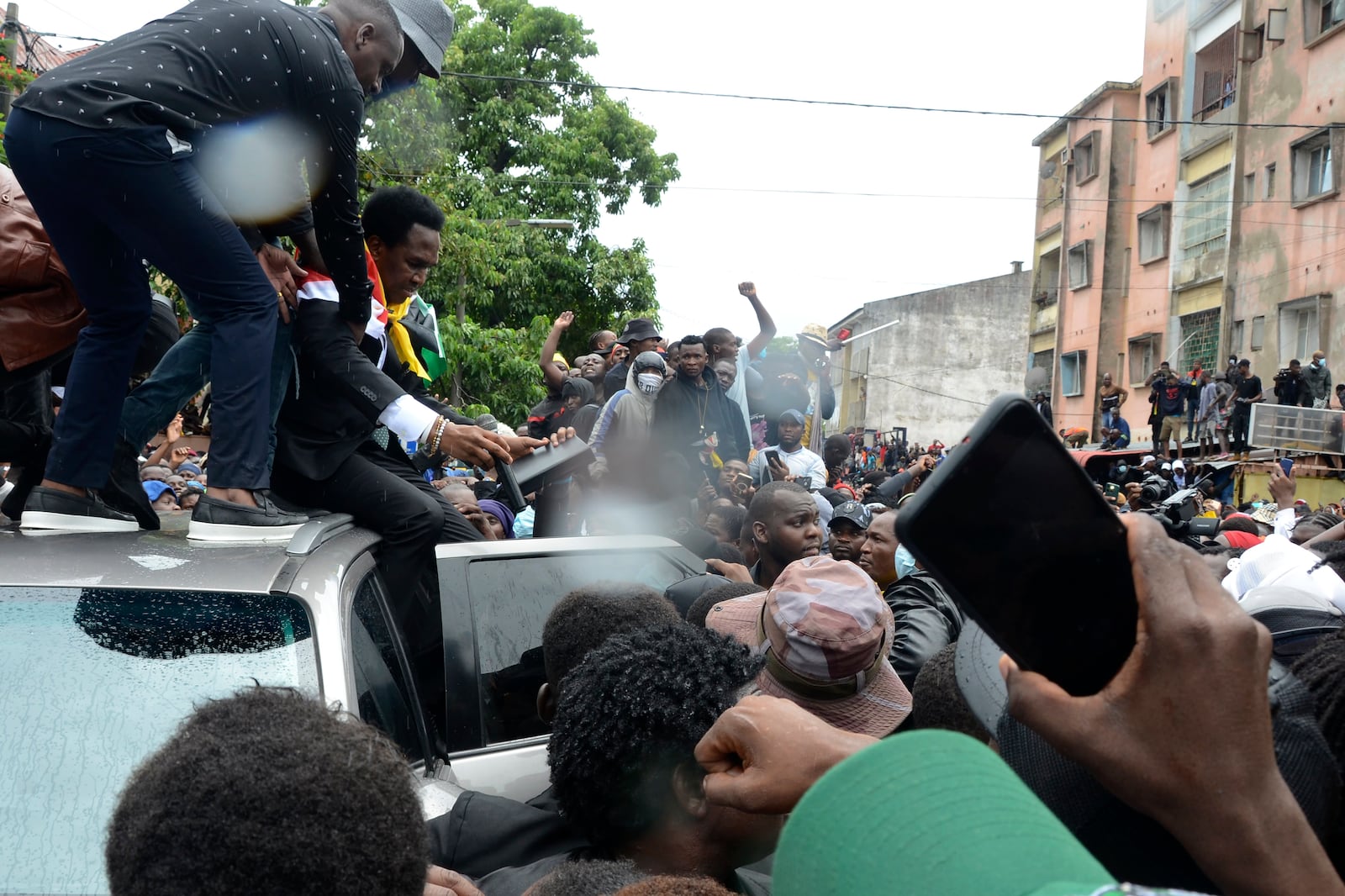 Mozambique's opposition leader Venancio Mondlane addresses supporters from the top of a vehicle on the street in Maputo, Mozambique, Thursday, Jan. 9, 2025. (AP Photo/Carlos Uqueio)