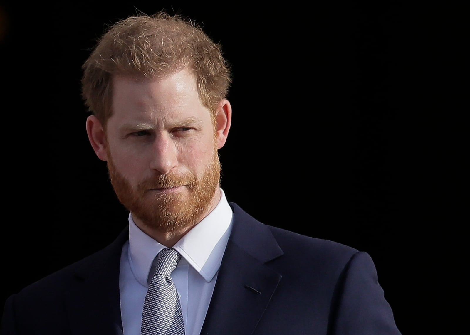 FILE - Britain's Prince Harry arrives in the gardens of Buckingham Palace in London, Jan. 16, 2020. (AP Photo/Kirsty Wigglesworth, File)