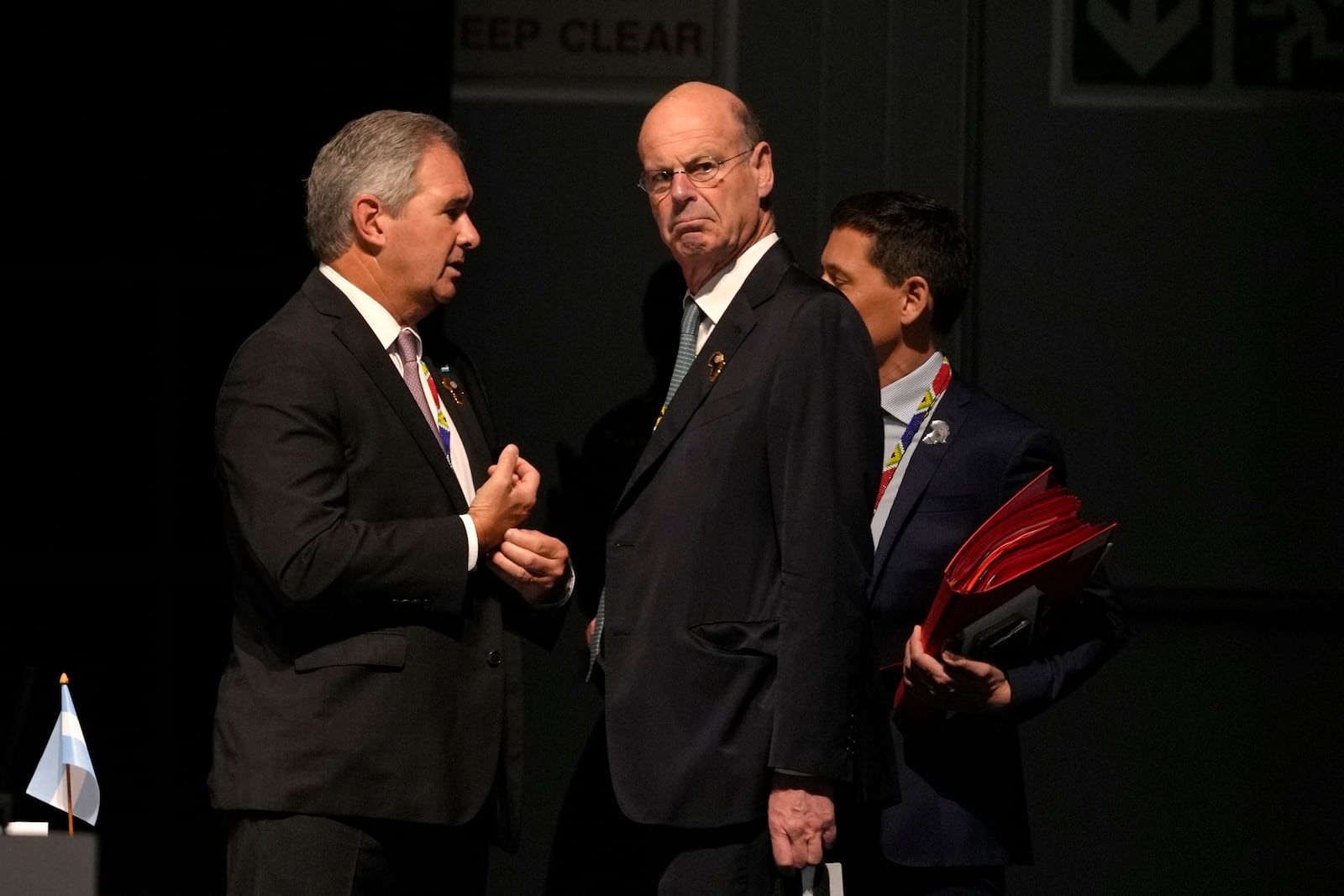 French Finance Minister Eric Lombard, right, chats with a fellow delegate at the G20 Finance Ministers and Central Bank Governors meeting in Cape Town, South Africa, Wednesday, Feb. 26, 2025. (AP Photo/Nardus Engelbrecht)