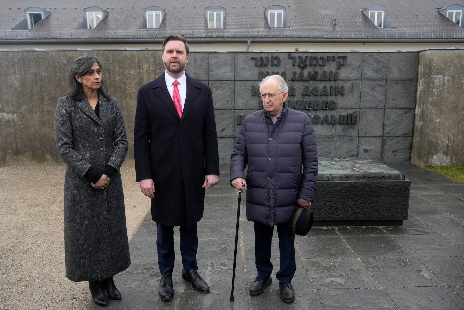 U.S. Vice President JD Vance and second lady Usha Vance meet with Abba Noor, right, a survivor of the Dachau Concentration Camp during a visit to the Dachau Memorial Site outside Munich, Germany, Thursday, Feb. 13, 2025. (AP Photo/Matthias Schrader)