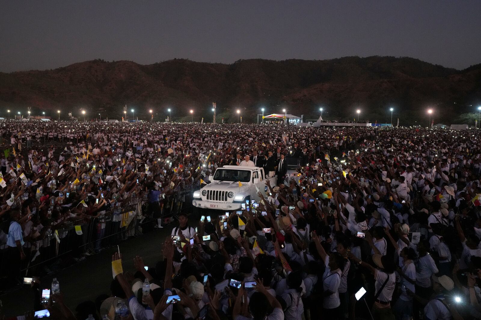 FILE - Pope Francis leaves after leading a holy mass at Tasitolu park in Dili, East Timor, Sept. 10, 2024. (AP Photo/Firdia Lisnawati, File)