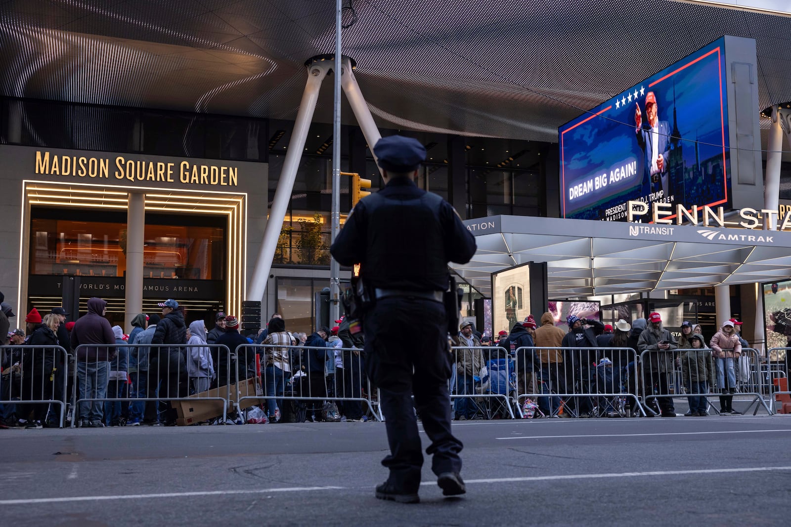 Supporters of Republican presidential nominee former President Donald Trump gather for his campaign rally outside Madison Square Garden, Sunday, Oct. 27, 2024, in New York. (AP Photo/Yuki Iwamura)