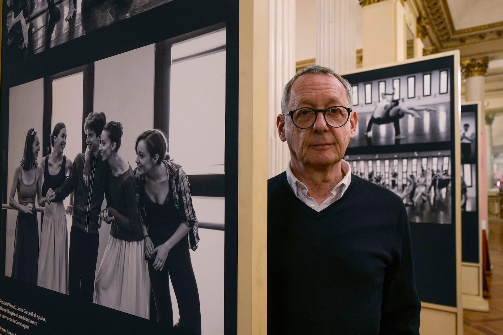 Photographer Gerard Uferas poses during the unveiling of the photo exhibition 'Lo sguardo nascosto' ( The hidden gaze), at the La Scala Opera House in Milan, Italy, Tuesday, Feb. 11, 2025. (AP Photo/Luca Bruno)