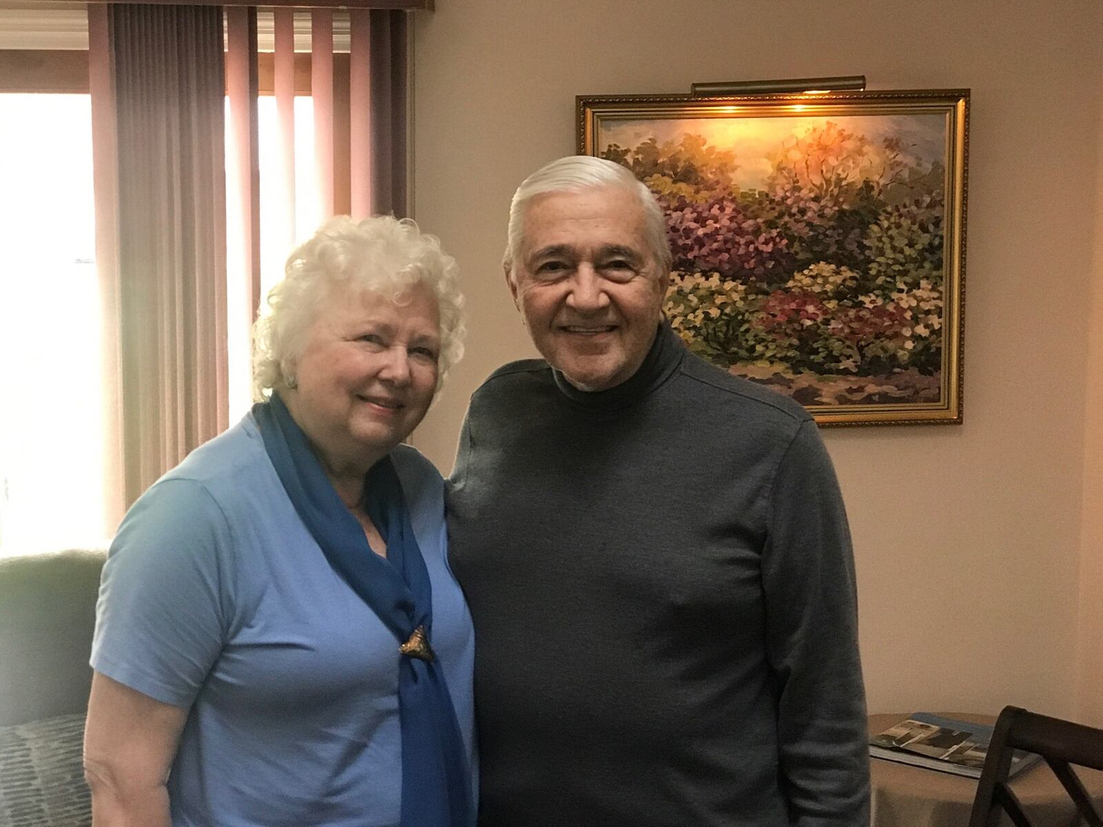 Diane and Roger McMurrin in the living room of their Lebanon home. Tom Archdeacon/STAFF