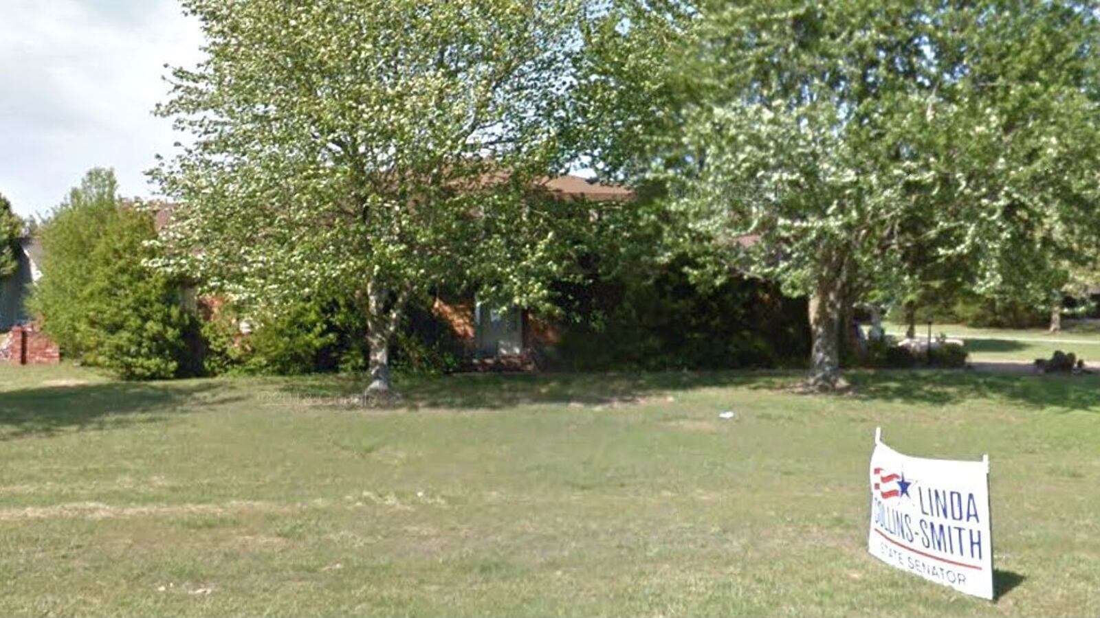 A campaign sign for former Arkansas state Rep. Linda Collins-Smith is seen outside her Pocahontas home in a May 2018 Street View image. Collins-Smith was found by her son and her father June 4, 2019, stabbed to death and hidden under a tarp in her driveway.