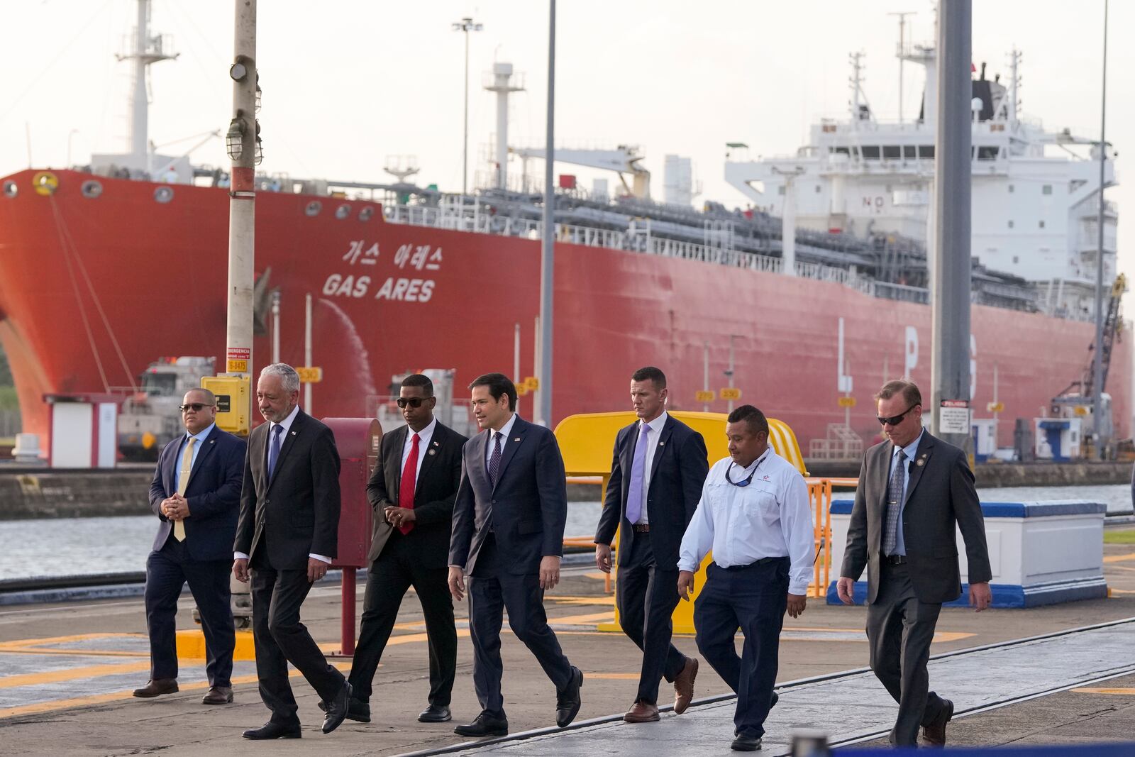 U.S. Secretary of State Marco Rubio, fourth from left, tours the Miraflores locks at the Panama Canal in Panama City, Sunday, Feb. 2, 2025. (AP Photo/Mark Schiefelbein, Pool)