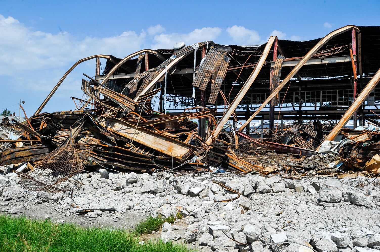 Crews demolish warehouse after massive fire in Hamilton