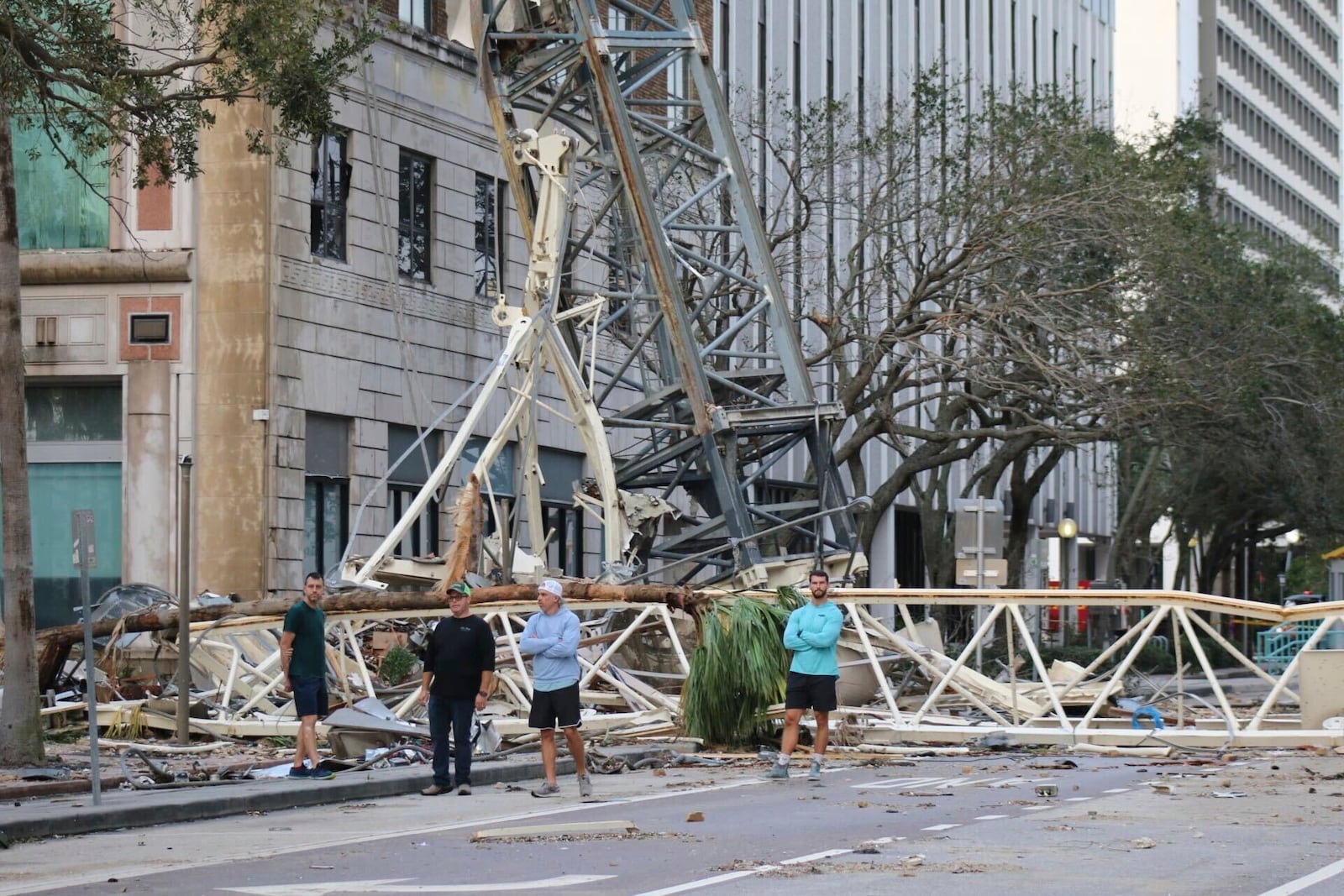 A construction crane fell over into an office building that houses the Tampa Bay Times headquarters, after Hurricane Milton, Thursday, Oct. 10, 2024. (Tampa Bay Times via AP)